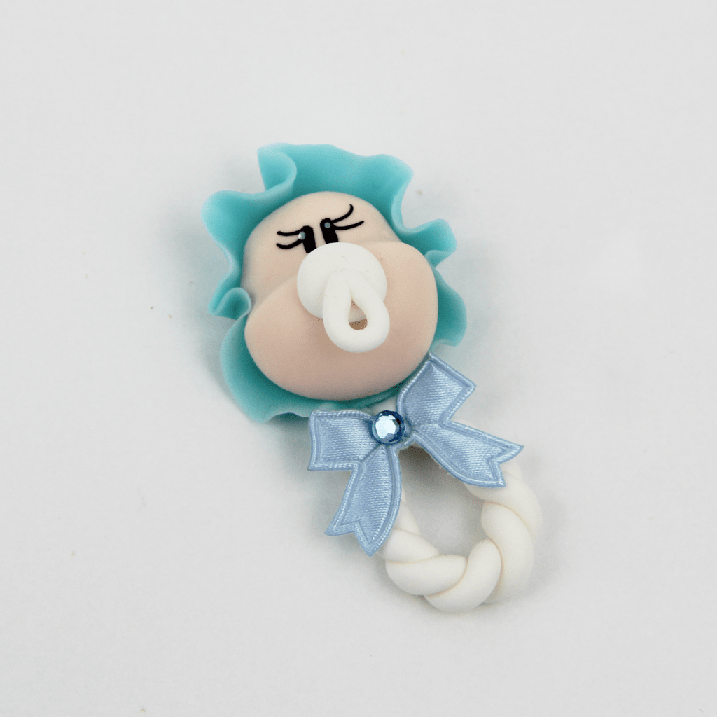 Figura Roca com Bebé de touca azul em Biscuit