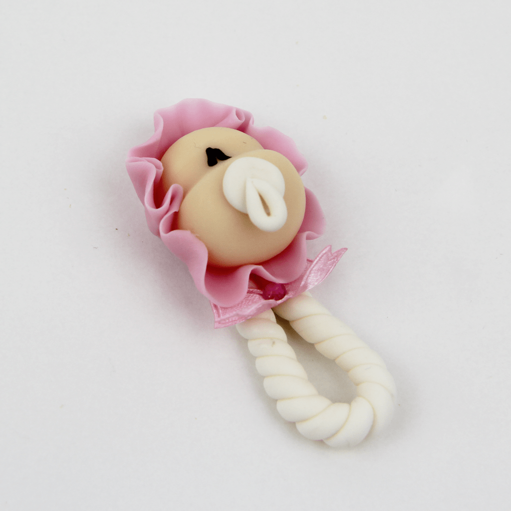 Figura Roca com Bebé de touca rosa em Biscuit